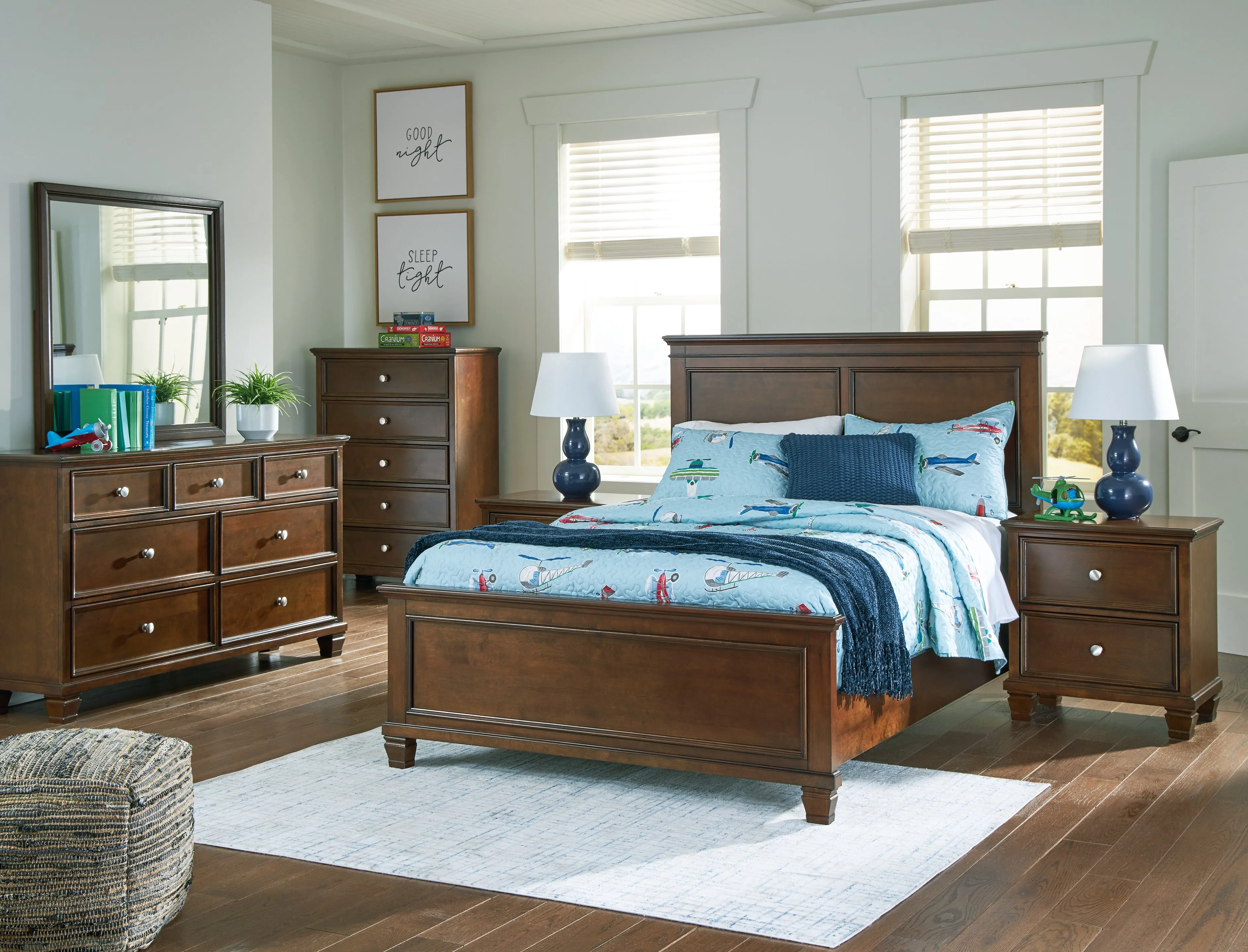 Danabrin Full Panel Bed with Mirrored Dresser and Chest in Brown