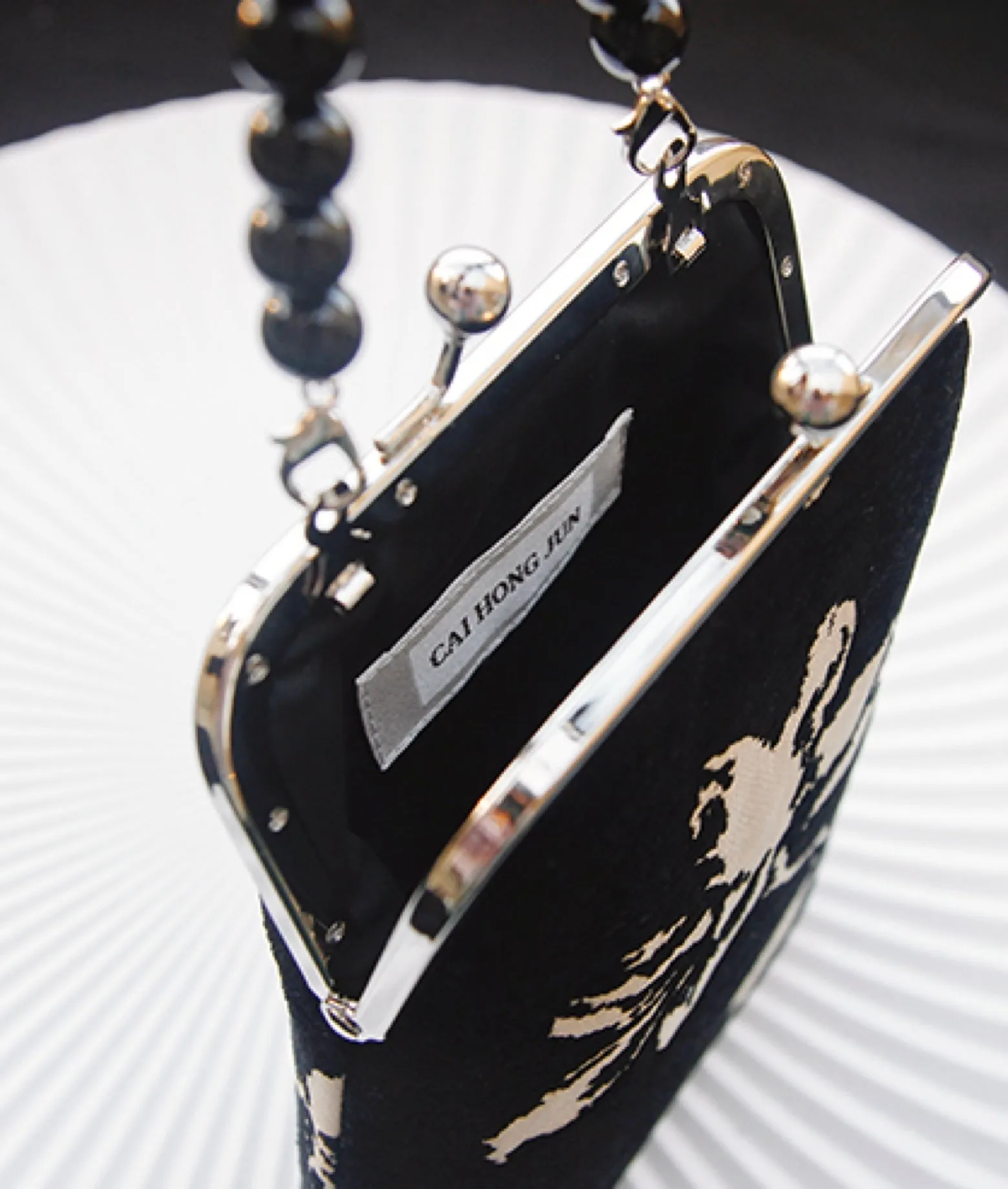 MAGNOLIA handheld crossbody bag