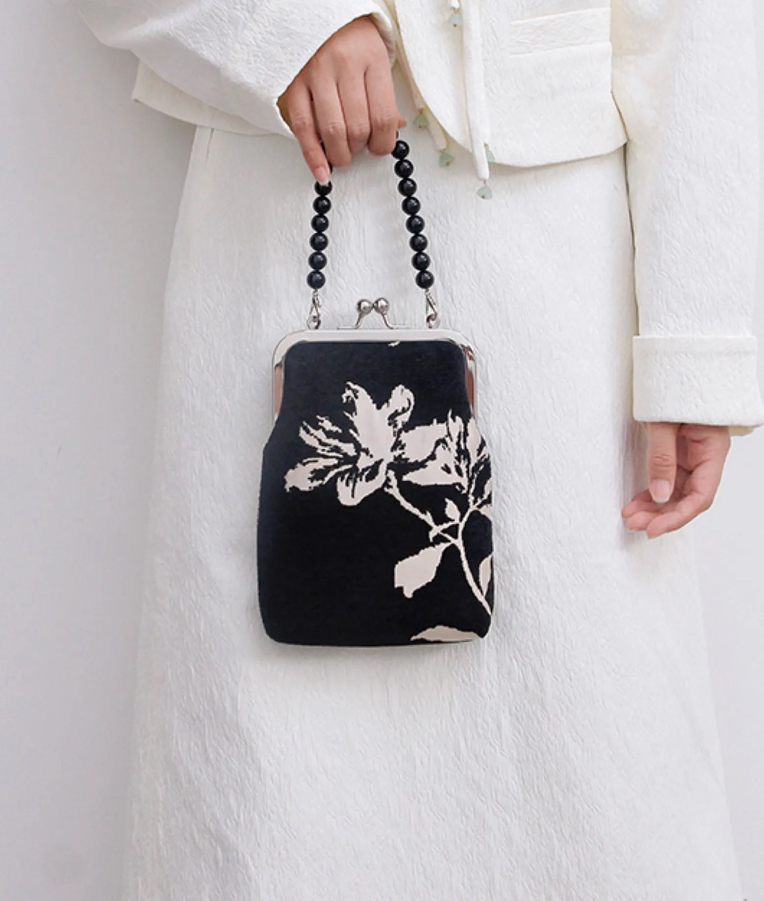 MAGNOLIA handheld crossbody bag