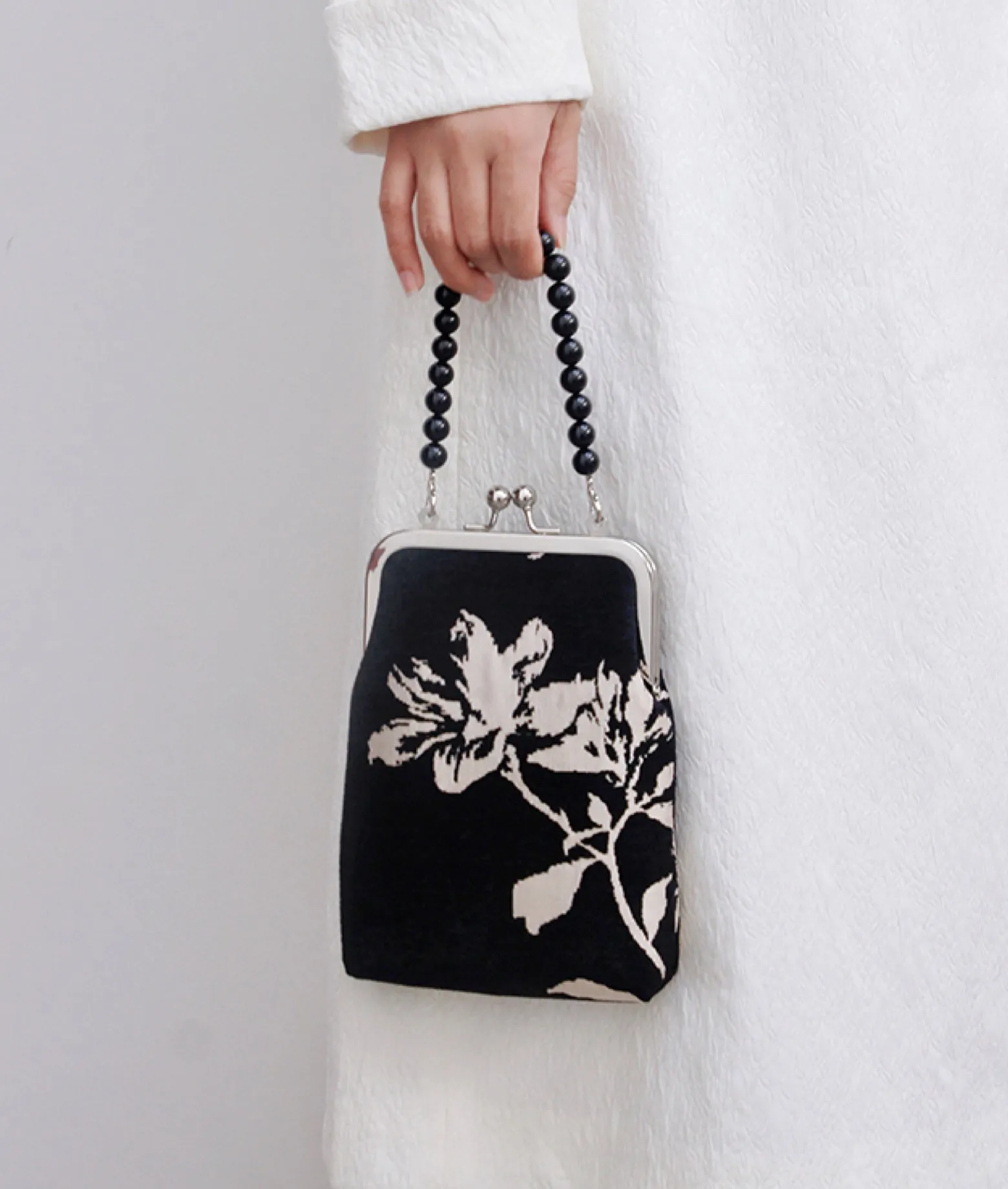 MAGNOLIA handheld crossbody bag