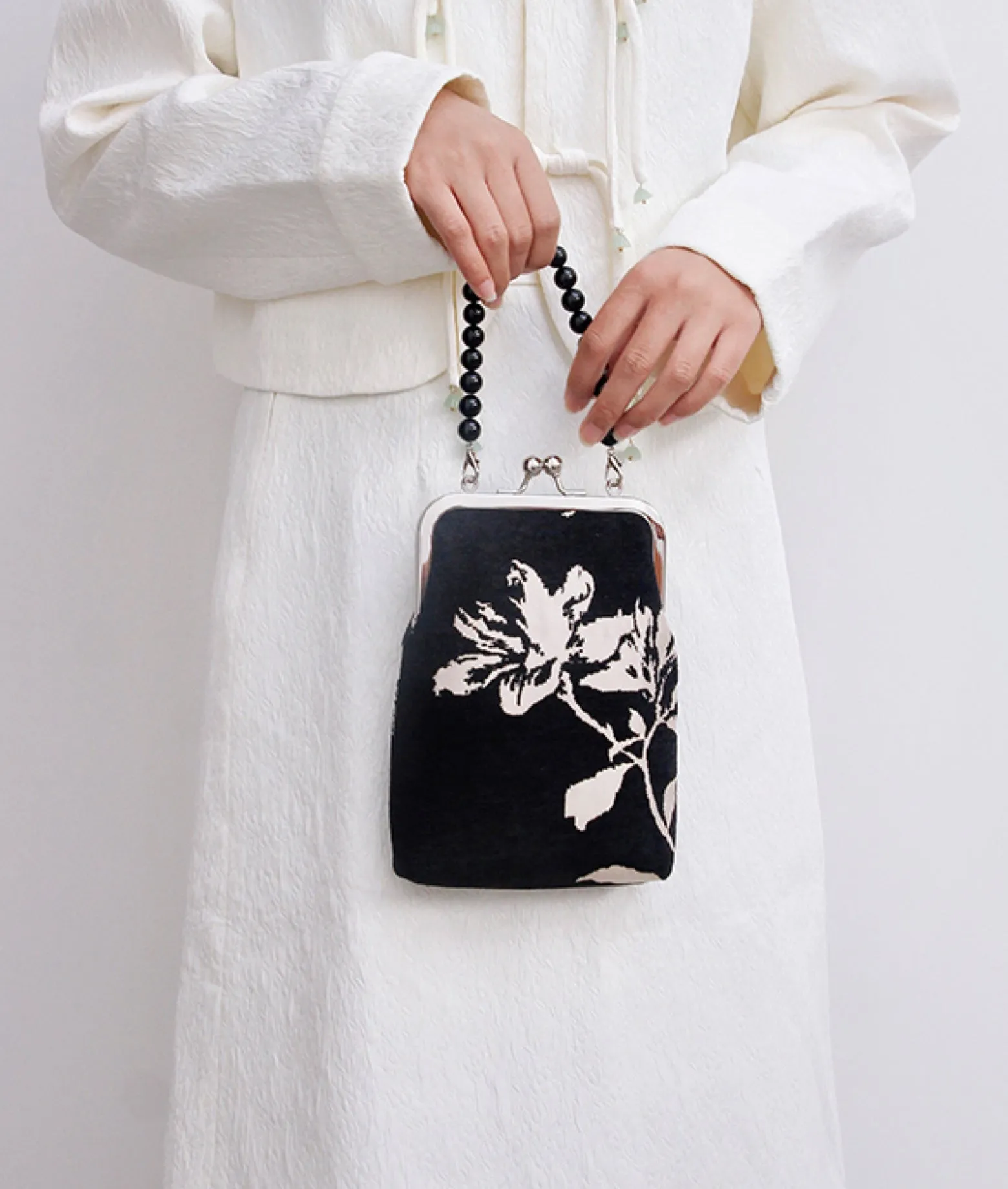 MAGNOLIA handheld crossbody bag